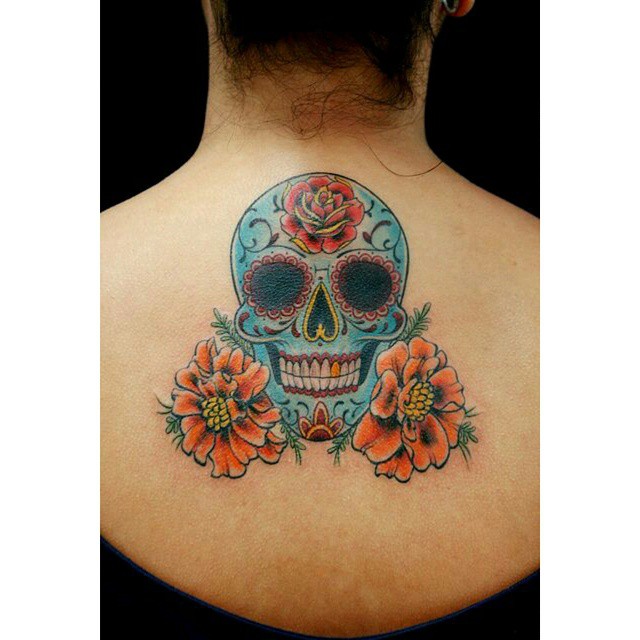 Smiling Chicano Skull tattoo on Back Best Tattoo Ideas Gallery