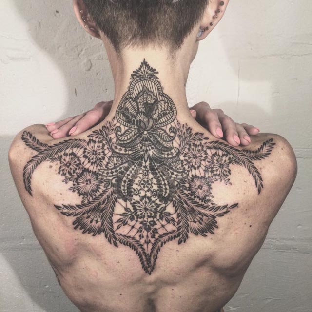 baroque pattern back tattoo