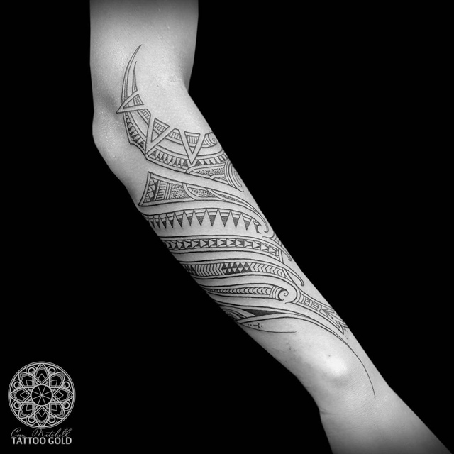forearm tattoo maori polynesian fusion