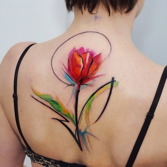 Flower tattoo tulip on back