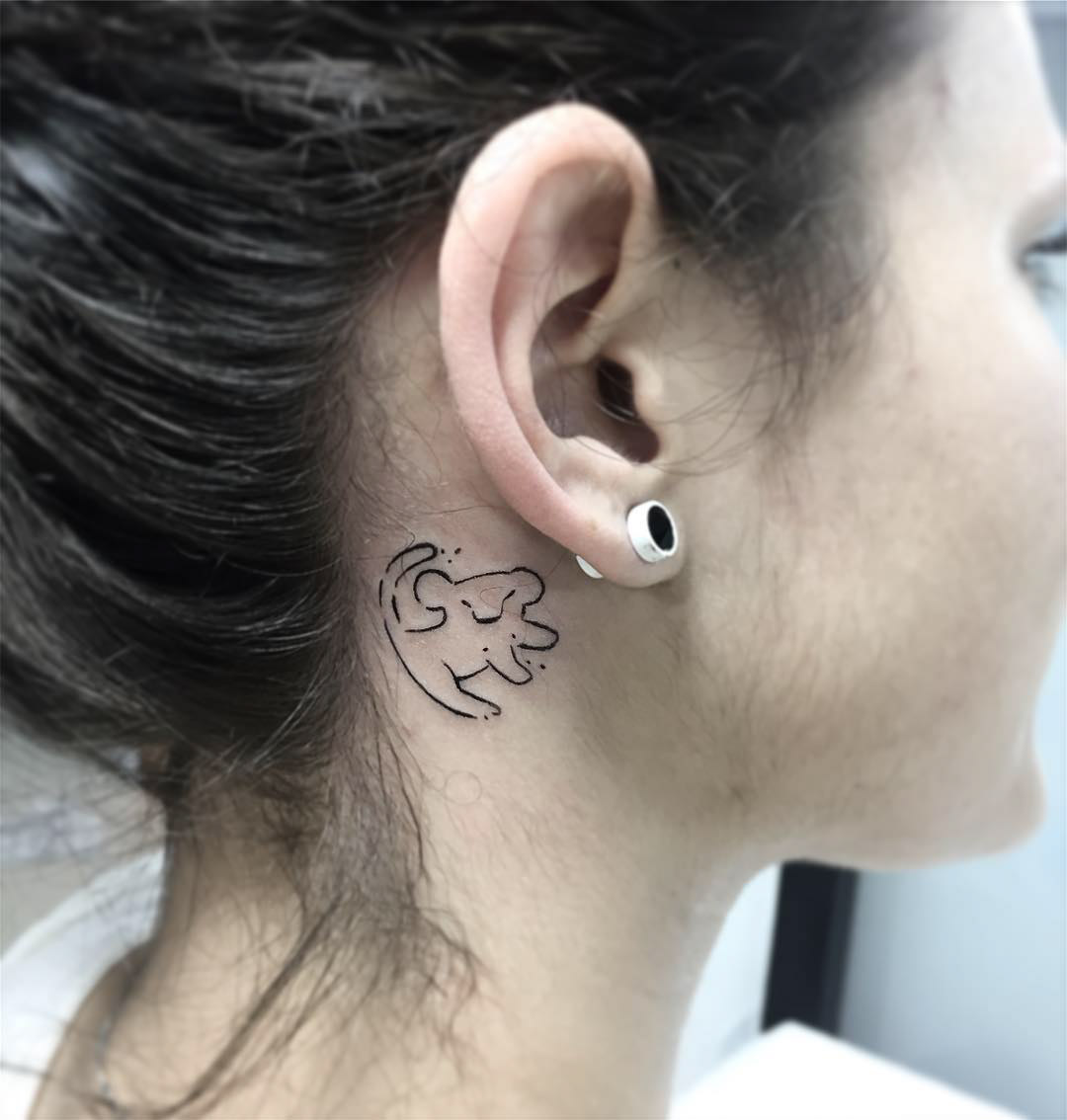 behind ear tattoo simba sign