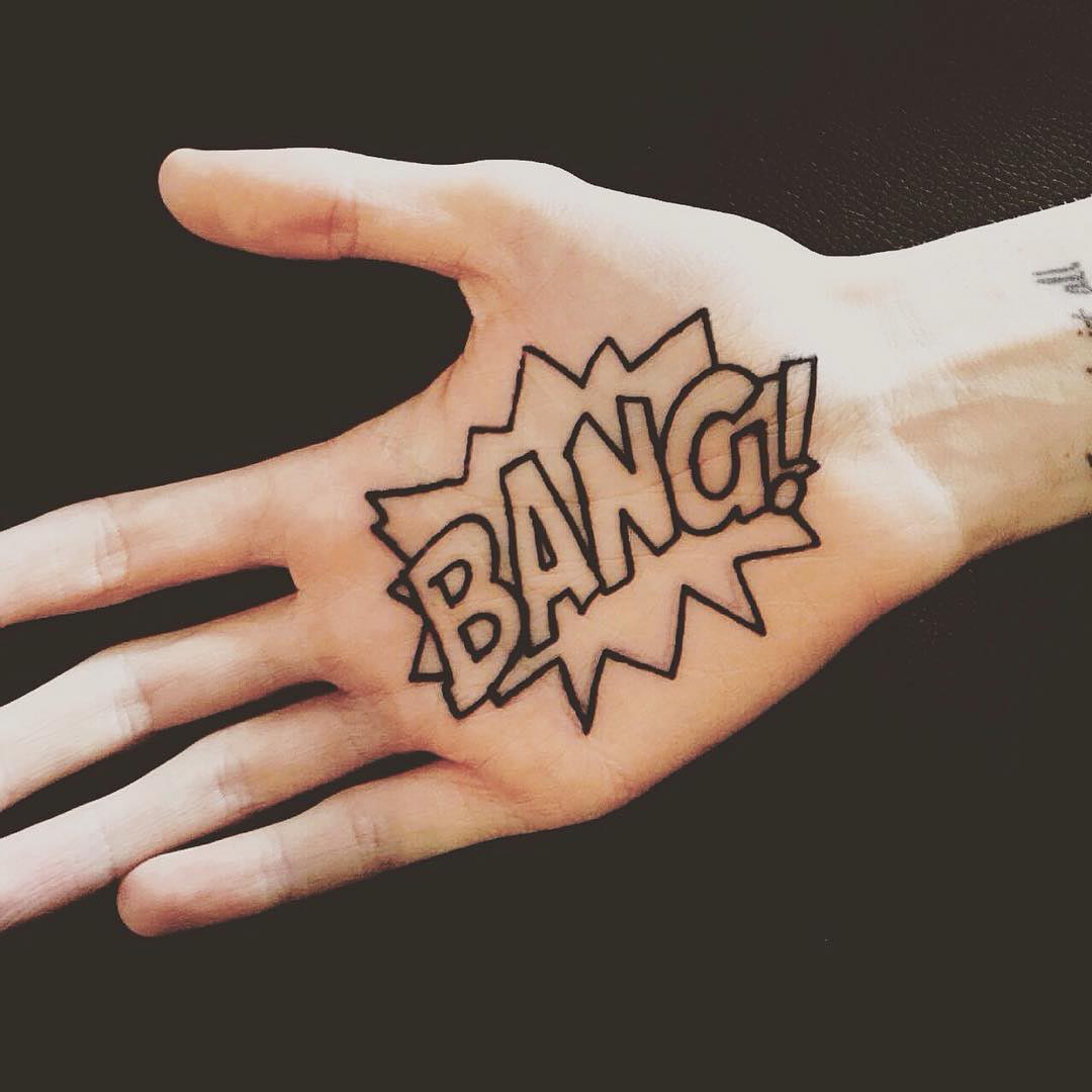 bang tattoo on palm by aidan rouse