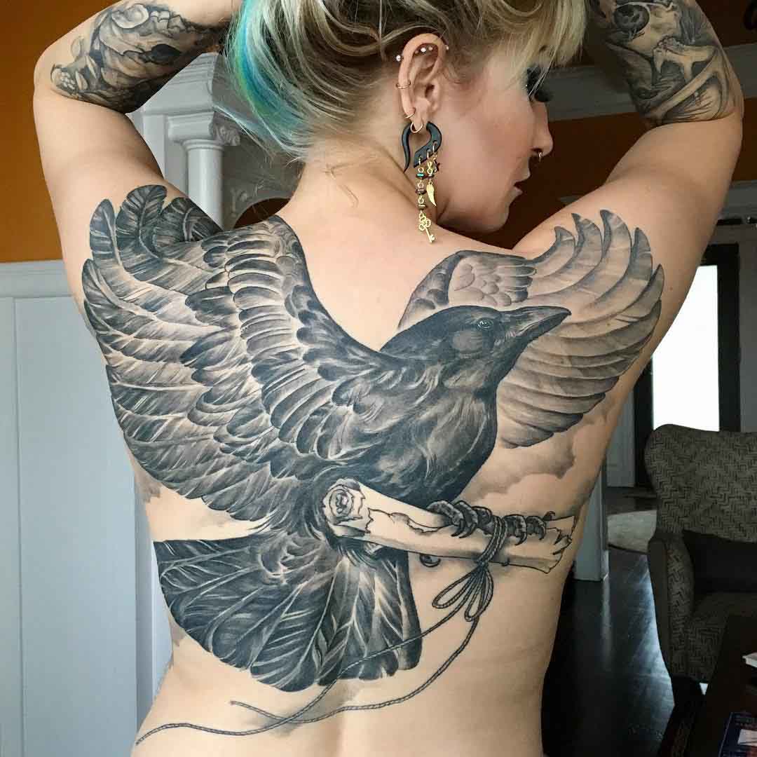 crow tattoo on girl's back