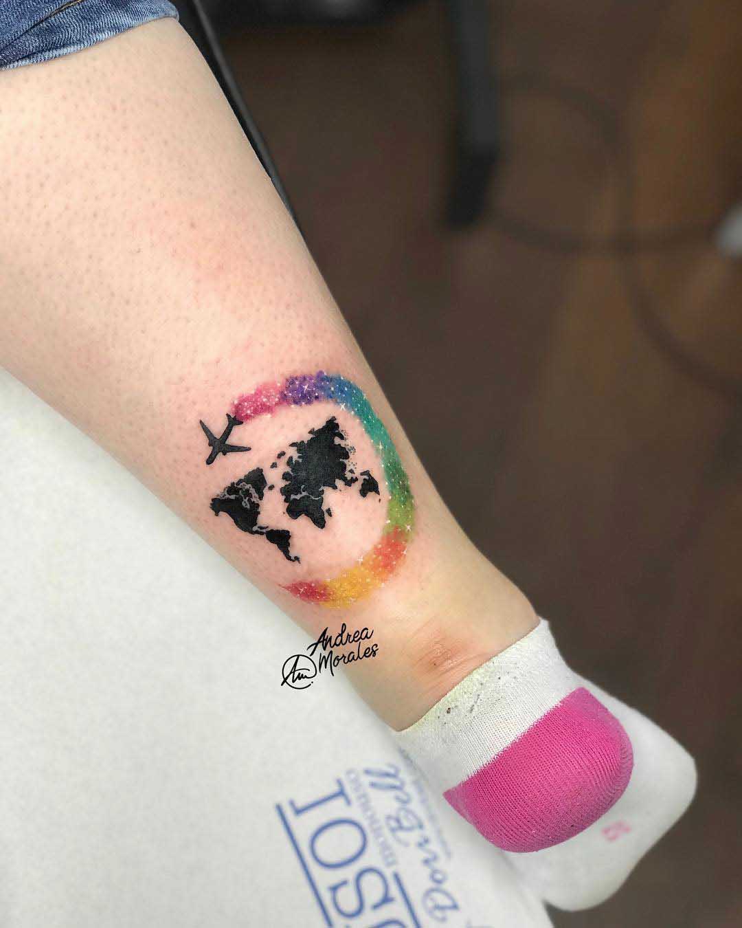 world trip tattoo on ankle