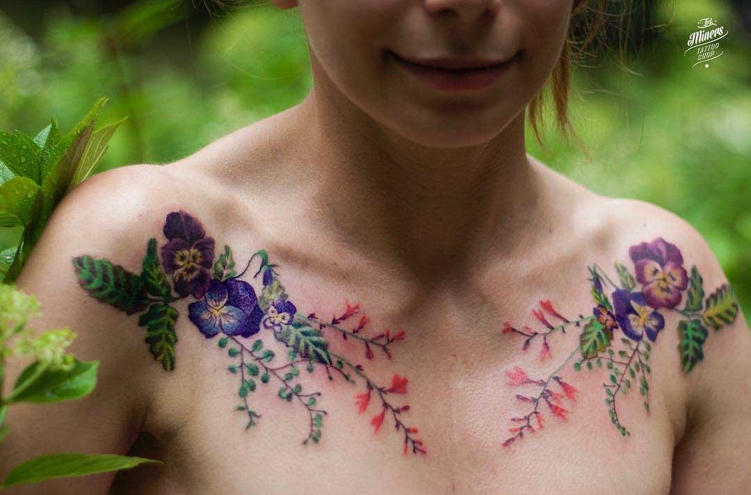 flower tattoos on collar bones