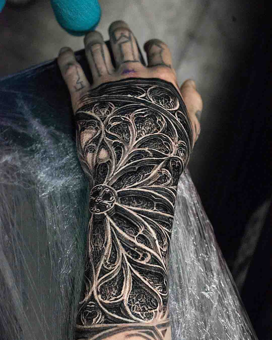 hand tattoo stained-glass