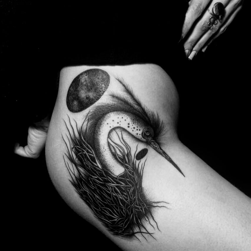 hip tattoo bird