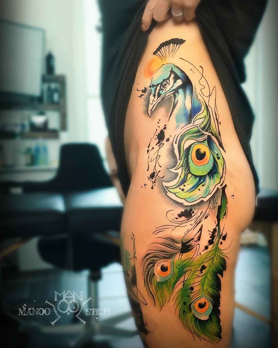 hip tattoo peacock